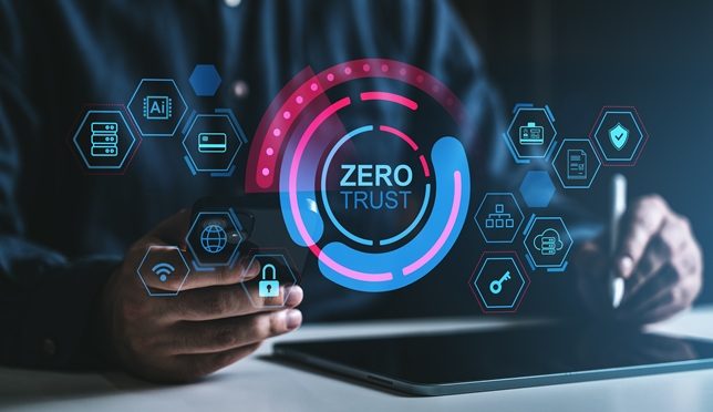 Business professional interacting with a digital hologram displaying zero trust security concepts with network and information protection icons